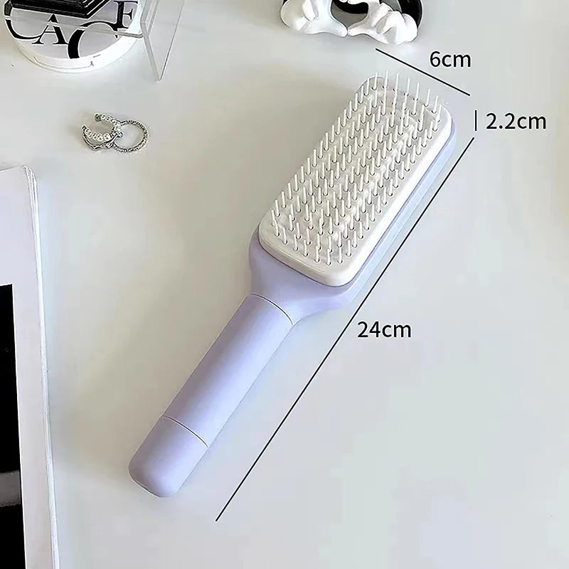 ILLMINIQUE ™ Self Cleaning Hairbrush